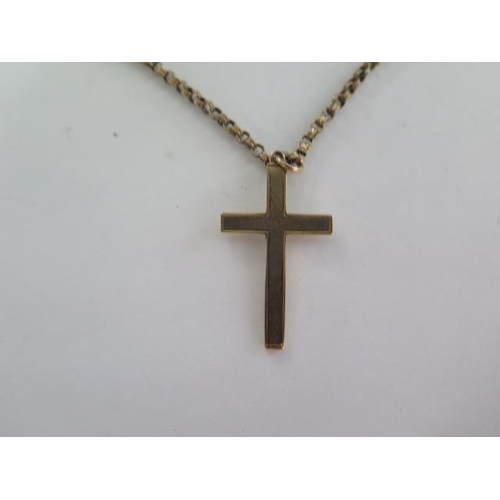 97 - A 9ct gold crucifix on a 9ct 52cm chain - good condition - approx weight 9.4 grams