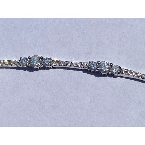 95 - A stunning Mappin and Webb 18ct white gold graduating diamond bracelet 3.80ct - Length 18cm - with b... 