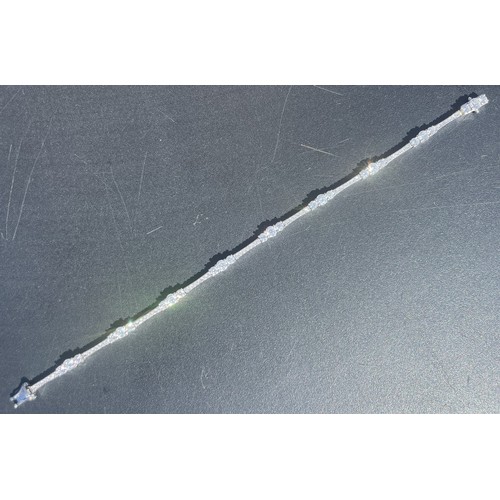 95 - A stunning Mappin and Webb 18ct white gold graduating diamond bracelet 3.80ct - Length 18cm - with b... 