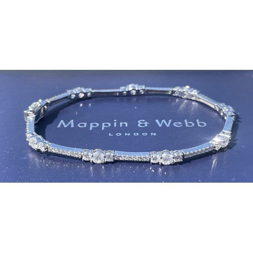 A stunning Mappin and Webb 18ct white gold graduating diamond bracelet 3.80ct - Length 18cm - with box and outer box - in very good condition . Mappin and Webb retail price £6250
