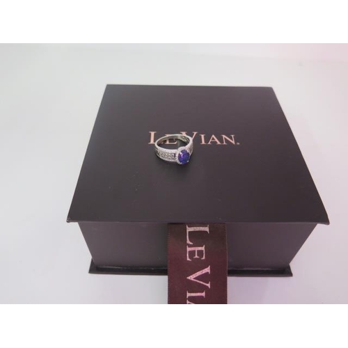 64 - A 14ct white gold Tanzanite and diamond Le Vian ring, the 1ct Blueberry tanzanite with 72 diamonds a... 