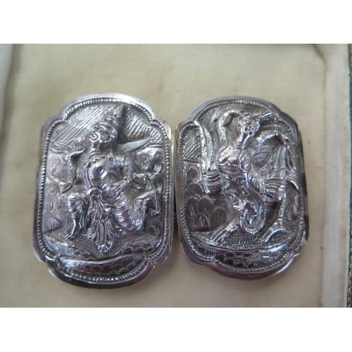 72 - A Nepalese white metal 2 part buckle, 7.5cm wide, approx 38 grams and a boxed set of gilt metal enam... 