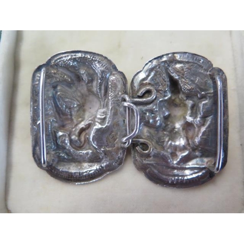 72 - A Nepalese white metal 2 part buckle, 7.5cm wide, approx 38 grams and a boxed set of gilt metal enam... 