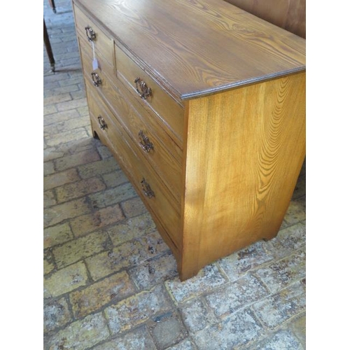 A circa 1900's ash chest of two over two drawers, bares label for