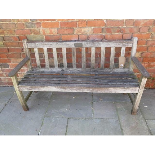 A vintage teak R. A. Lister wooden garden bench dated 1970 - no play in ...