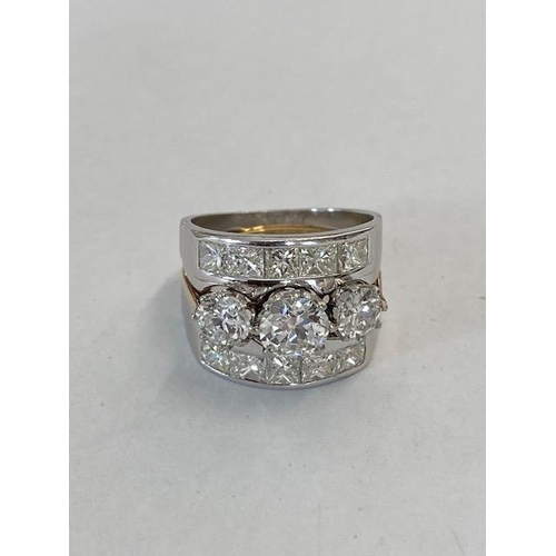 A fine quality 18ct white and yellow gold diamond designer ring - total diamond weight approx 4ct - diamonds are well matched and bright and lively - head size approx 19mm x 16mm - ring size O - approx weight 12.6 grams - in good condition
