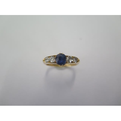 68 - An 18ct yellow gold sapphire type stone and diamond ring size Q - approx weight 4.2 grams - diamonds... 