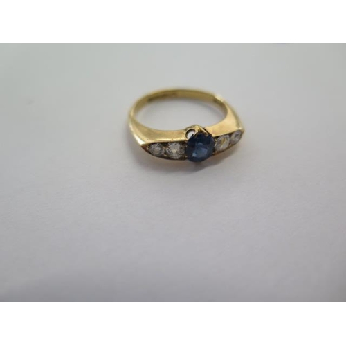 68 - An 18ct yellow gold sapphire type stone and diamond ring size Q - approx weight 4.2 grams - diamonds... 