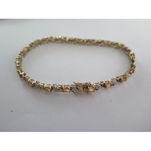 76 - A 9ct yellow gold Citrine bracelet - Length 20cm - approx weight 10 grams with certificate - in good... 