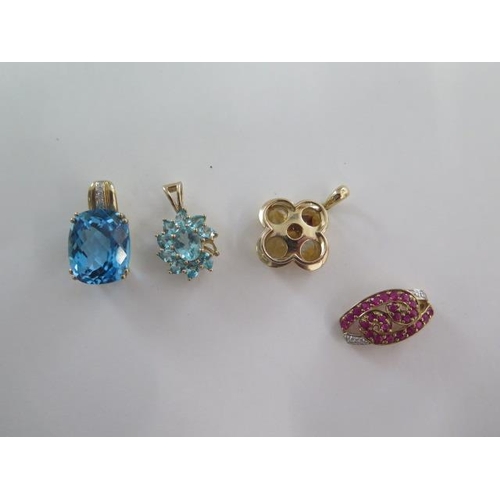 78 - Four 9ct gold pendants - total weight approx 14 grams - all good, except one stone loose to blue apa... 