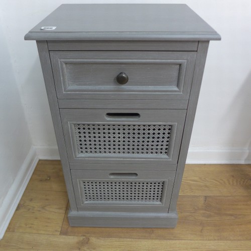 666 - A  modern  three drawer cupboard  71 cm tall x 40 x 32