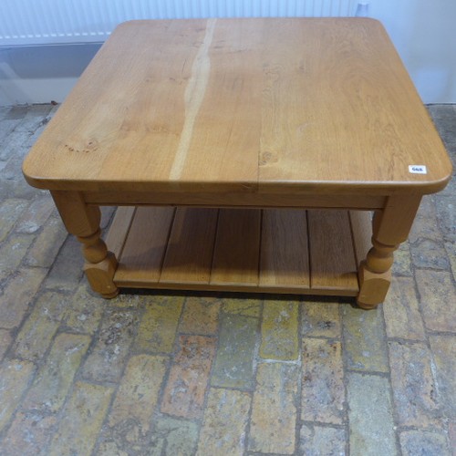 668 - An oak  coffee table 49 cm tall 90 x 91