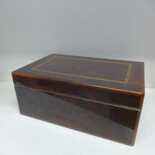 73 - A Dunhill burr wood cigar humidor with key - Height 15cm x 35cm x 23cm - in generally good condition... 