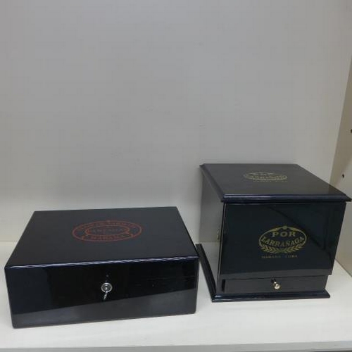 77 - Two ebonised cigar humidors - largest with five internal trays and a base drawer - some staining, no... 