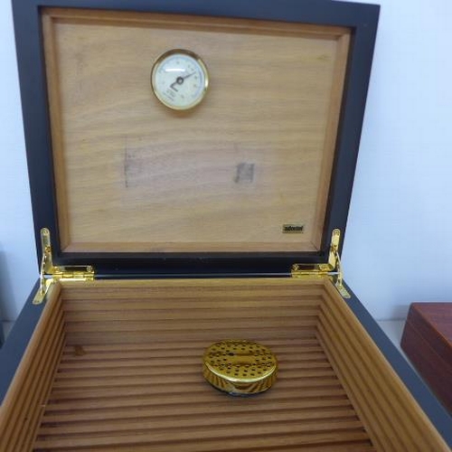 80 - Four cigar humidors and two boxes - trays missing to Montecristo - some wear to all but reasonably g... 