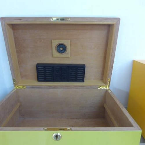 80 - Four cigar humidors and two boxes - trays missing to Montecristo - some wear to all but reasonably g... 