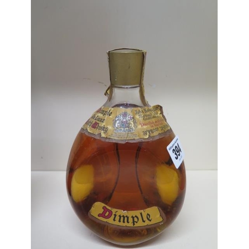 391 - A bottle of John Haig and Co Ltd Dimple de luxe Scotch whiskey - level and seal good