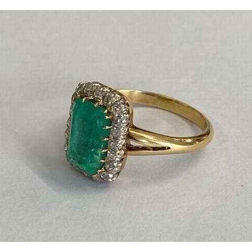 1 - A good yellow gold emerald and diamond ring - The central rectangular round corner step cut emerald ... 