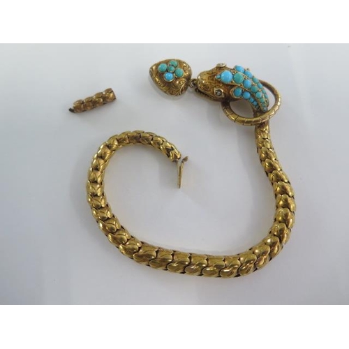 12 - A yellow metal articulated serpent bracelet set with turquoise cabochons and diamond set eyes with a... 