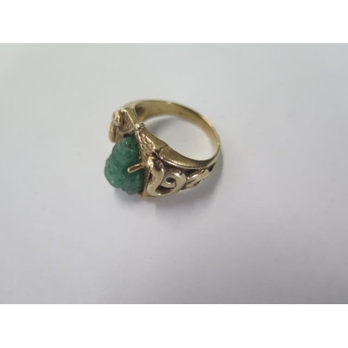 19 - An Oriental yellow gold Jade Buddha ring size R - approx weight 9.5 grams - generally good, surface ... 