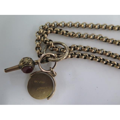 2 - A 10ct yellow gold long belcher watch chain with a watch key and a masonic rotating fob - chain leng... 