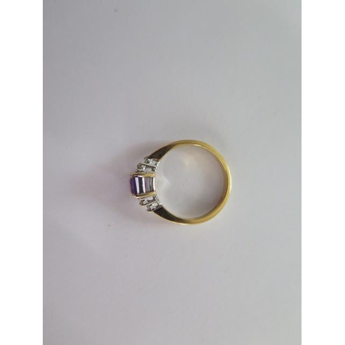 21 - A hallmarked 18ct yellow gold amethyst and diamond ring size N - approx weight 3.6 grams - in good c... 