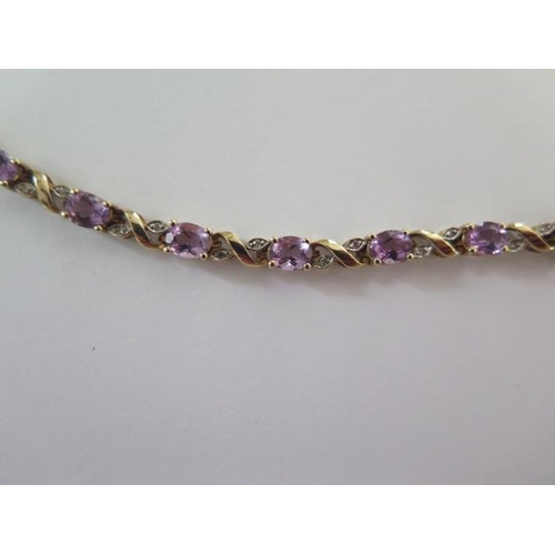 25 - A 9ct yellow gold amethyst and diamond bracelet - Length 18cm - approx weight 6.5 grams - in good co... 