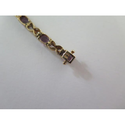 25 - A 9ct yellow gold amethyst and diamond bracelet - Length 18cm - approx weight 6.5 grams - in good co... 