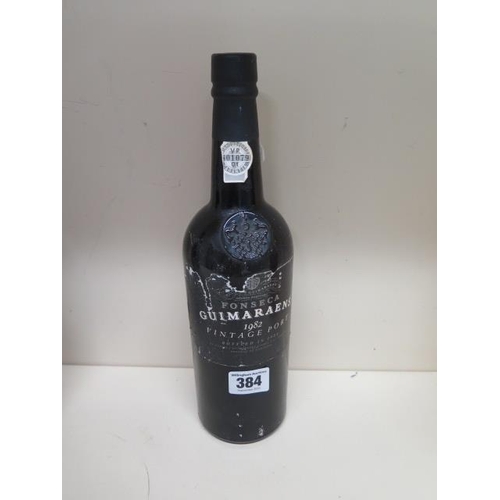 384 - A bottle of Guimaraens 1982 Vintage Port - bottle in 1984 - seal appears intact