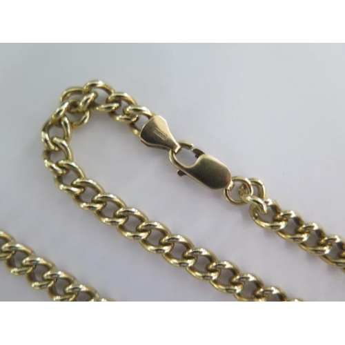 54 - A 9ct yellow gold 78cm long chain - approx weight 55.8 grams - in good condition