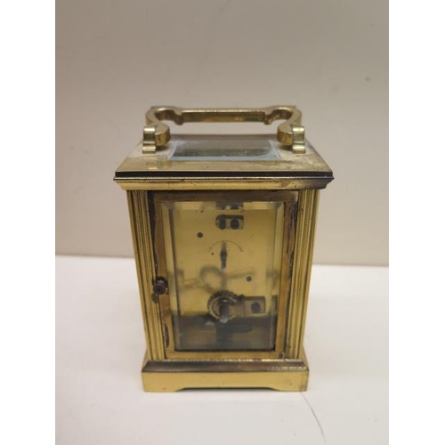 545 - A brass carriage clock - the dial signed Charles Frodsham London - overall 15cm - running, chips to ... 