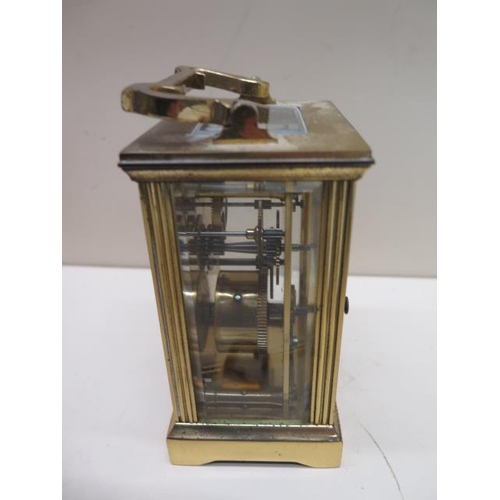 545 - A brass carriage clock - the dial signed Charles Frodsham London - overall 15cm - running, chips to ... 