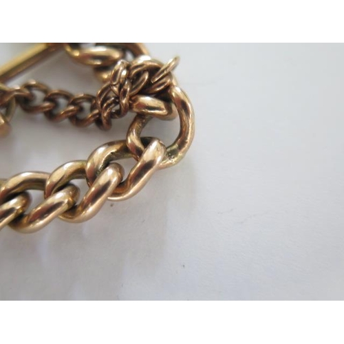 66 - A 9ct yellow gold graduating double Albert watch chain - Length 37cm - approx weight 47 grams - some... 