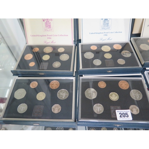 205 - Sixteen United Kingdom proof coin sets running from 1984 to 1998 with a duplicate 1993 set