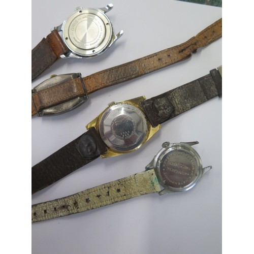 186 - A Bernex 17 Jewel automatic date wristwatch (working) an Oris watch, a Tusal watch and a Benson silv... 