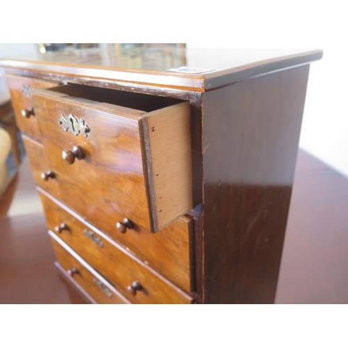 613 - A small sample/apprentice/collectors walnut five drawer chest of drawers - Height 48cm x 46cm x 23cm