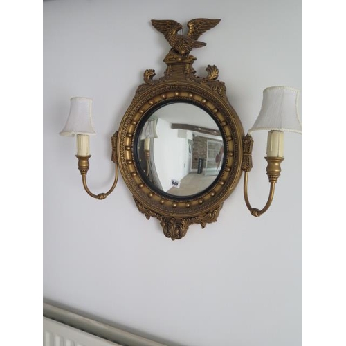 615 - A Georgian style gilt girondale wood wall mirror with two side lights