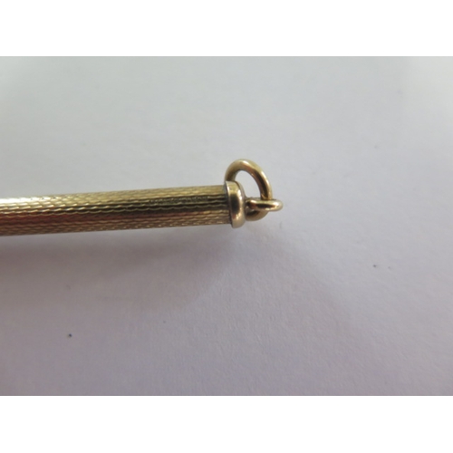 10 - A hallmarked 9ct yellow gold fob toothpick - approx weight 2.7 grams