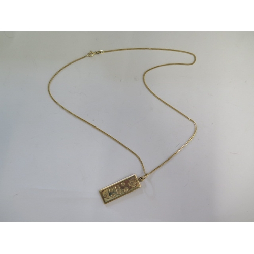 101 - A 9ct yellow gold ingot pendant on a 9ct yellow gold chain, 46cm - total weight approx 10.8 grams