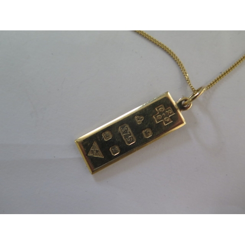 101 - A 9ct yellow gold ingot pendant on a 9ct yellow gold chain, 46cm - total weight approx 10.8 grams