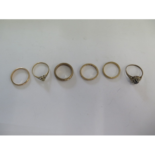 104 - Five 9ct gold rings sizes K,L,M and a gilt metal ring - total weight approx 11 grams