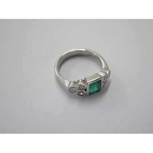 109 - An 18ct white gold diamond and green stone ring - central stone approx 6mm x 5mm x 3.5mm - ring size... 