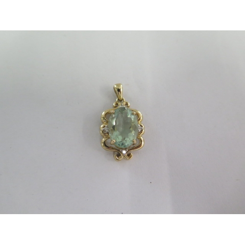 115 - A 9ct yellow gold flourite and diamond pendant - 27mm tall - approx weight 5 grams - good condition,... 