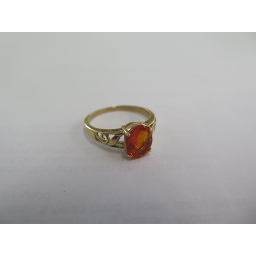 125 - A 9ct yellow gold fire opal ring size O/P - approx weight 2.5 grams - in good condition with certifi... 