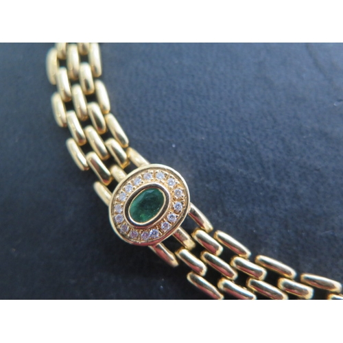 127 - An 18ct yellow gold emerald and diamond necklace with Egyptian marks - Length 39cm, heads 13mm x 11m... 