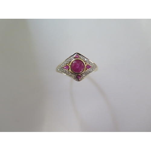 130 - A 9ct yellow gold Luke Stockley of London art deco style ruby and diamond ring, head size approx 12m... 