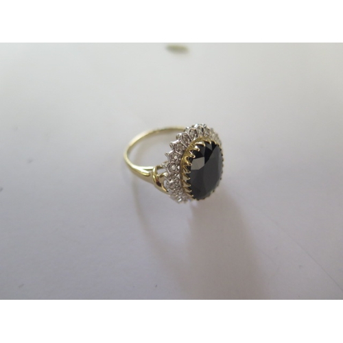 132 - A 9ct yellow gold diamond and sapphire ring, head size approx 19mm x 17mm - ring size approx P - In ... 