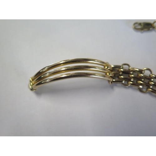 14 - A 9ct yellow gold bracelet approx 17 grams - generally good, some wear to end ring