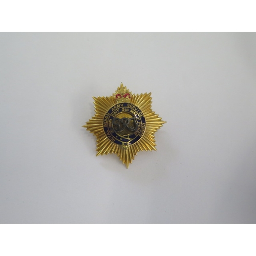 140 - A 9ct yellow gold and enamel Royal Indian Army Service Corps badge - Width 31mm - approx weight 10 g... 