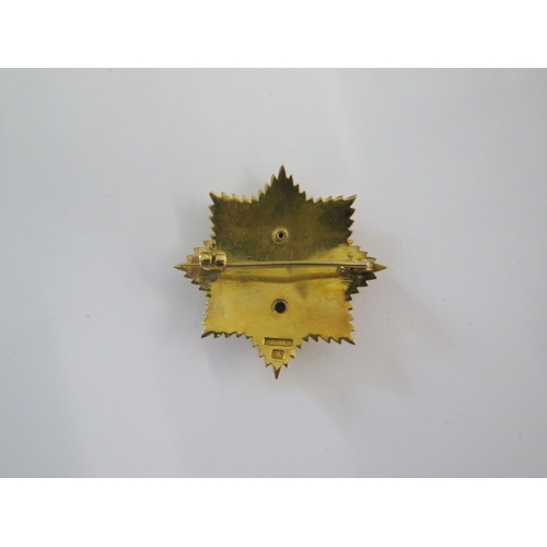 140 - A 9ct yellow gold and enamel Royal Indian Army Service Corps badge - Width 31mm - approx weight 10 g... 